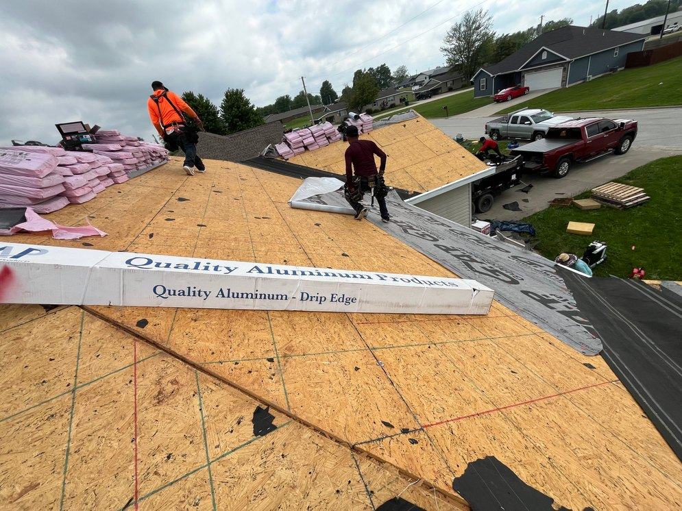 New shingles going down over fresh underlayment