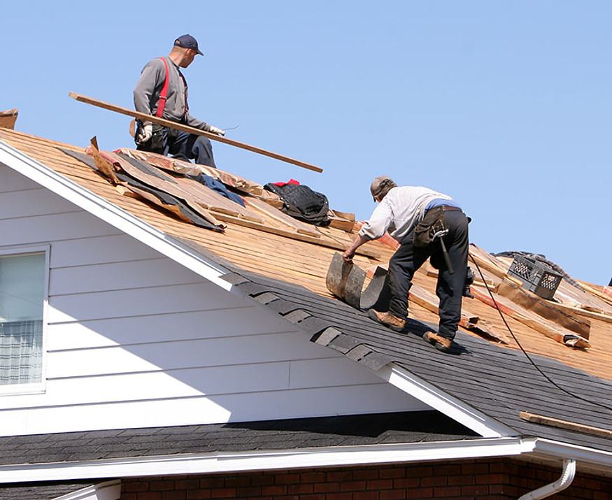 A GreenBros crew working a roof replacement